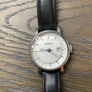 Silver fossil watch